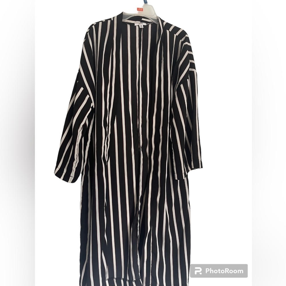 Worn once, cardigan, some red lines in design